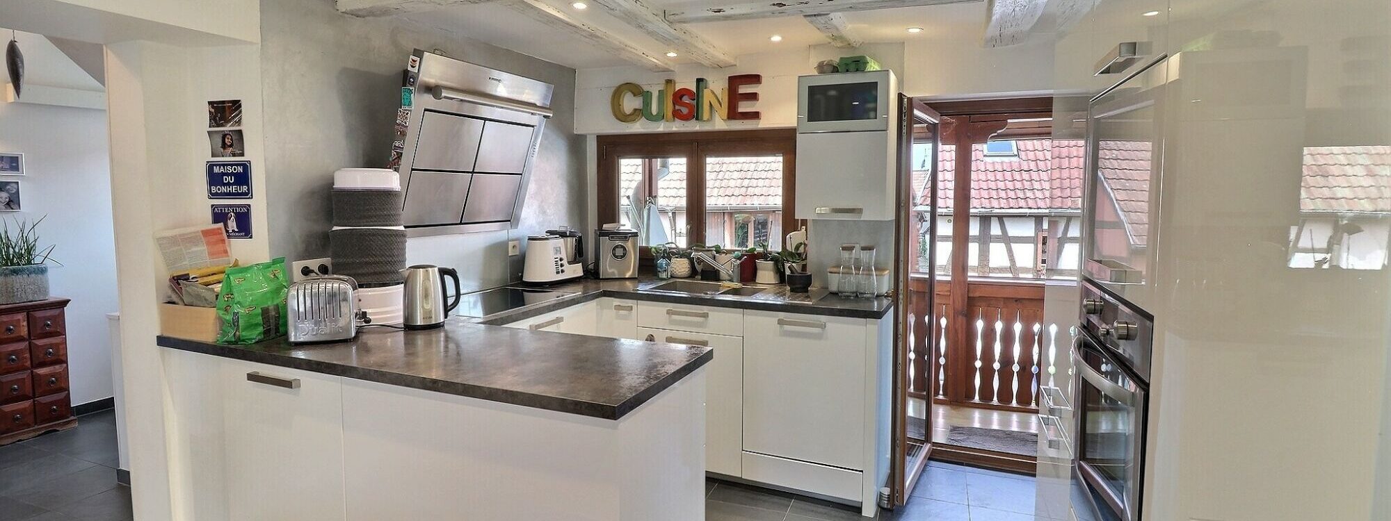 EXPOSIO_134458403 2000X750 | Agence immobilière Pierre à Colmar Agréable maison de 151m² dans le vignoble au cœur de Wettolsheim Wintzenheim